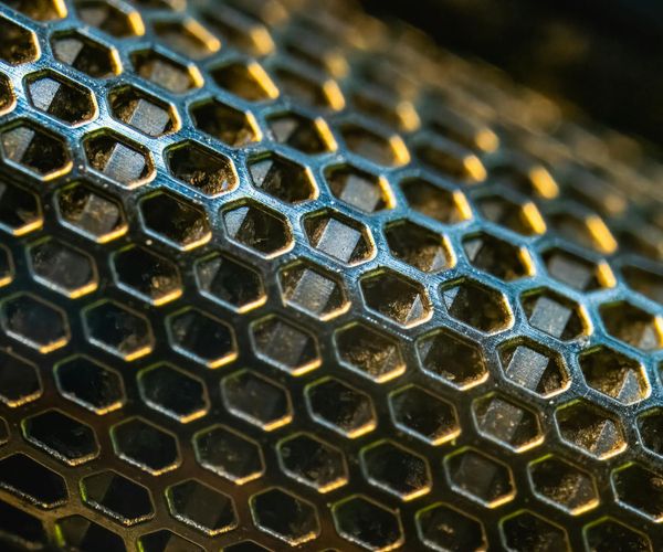 Geometric energy structure symbolizing strength and structural integrity